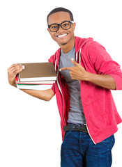 Excited, happy young student in glasses, holding books,