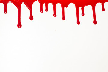 Blood dripping on white background