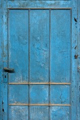 Closeup of a blue wooden door