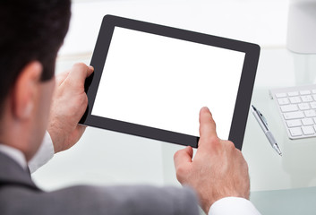 Businessman Holding Digital Tablet