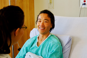 Patient smiling with nurse