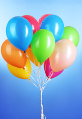 Colorful balloons on blue background