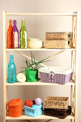 Beautiful white shelves with different home related objects,