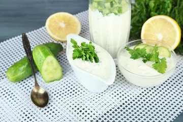 Cucumber yogurt in glass and bowl,