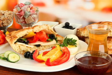 Traditional Turkish breakfast on table on bright background
