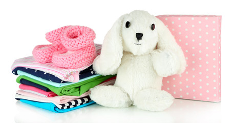 Washing powder with children clothes isolated on white