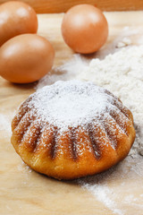 Easter yeast cake on wooden kitchen board