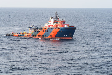 Fototapeta premium supply boat in oilfield and cargo