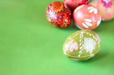 traditional easter eggs on green background