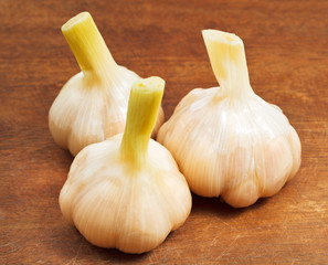 pickled garlic on wooden board