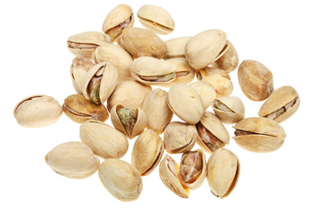 many salted pistachio nuts close up