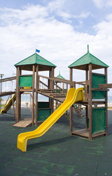 Wooden kids game structure in pubblic area