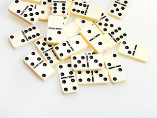 scattered dominoes on white