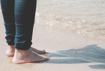 Barefoot on the beach in Australia