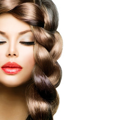 Hair Braid. Beautiful Model Woman with Healthy Long Brown Hair