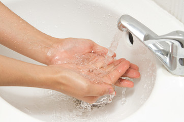 Fototapeta premium Washing hands under flowing tap water