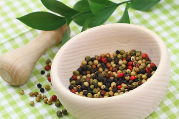 Mortar and pestle with mixed peppers