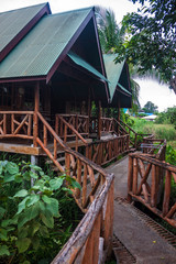 Huts above water in Kanchanaburi, Thailand