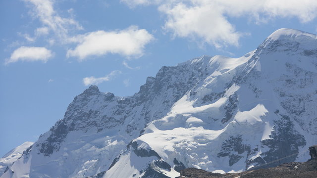 Motion panning time lapse cloud vortices Swiss Alps, Switzerland