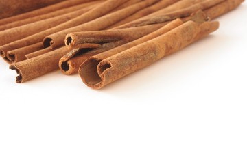 Cinnamon sticks on white background