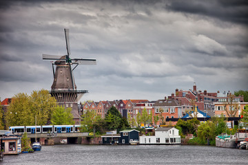 Fototapeta premium The Gooyer Windmill in the City of Amsterdam