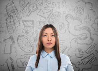 Young business woman thinking of her plans closeup face portrait