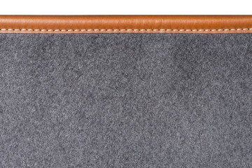 Macro of sewn leather binding of rug