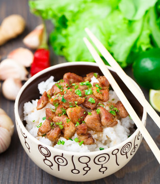 Bowl of rice with meat