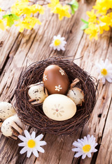 Fototapeta na wymiar Easter eggs on wood