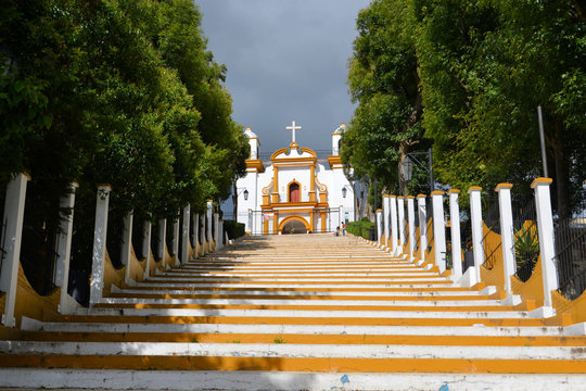 Colorful catholic chapel on a hill at Easter