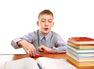 Schoolboy plays with a Toy