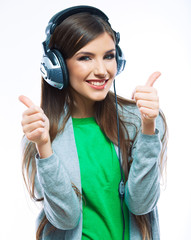 Music teenager girl dancing against isolated white background