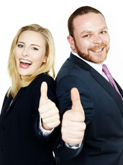 Successful business people show thumbs up