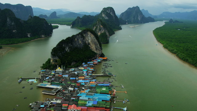 Aerial view tourist vessels leaving Ko Panyee, Phang nga Bay, Thailand