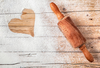 Heart drawn in scattered flour