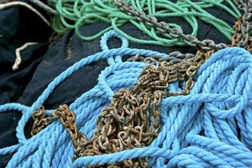 Heap of mooring rope and metal chain. © annalovisa