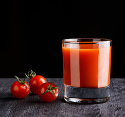 Glass of tomato juice on a table