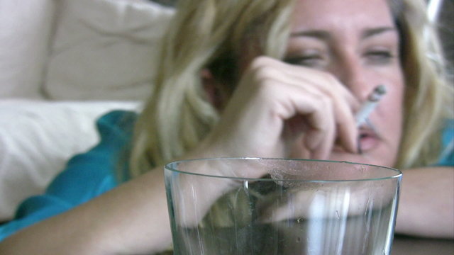 woman in depression, drinking alcohol
