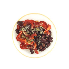 Vegetarian vegetable salad in round bowl isolated close up