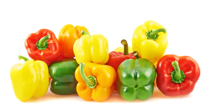 Pile of colorful bell peppers isolated