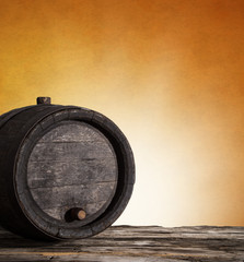 Wine barrel on wooden background