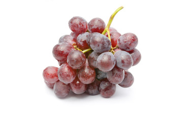 Fresh red grapes isolated on white