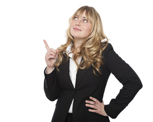 Attractive businesswoman pointing above her head