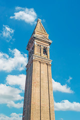 Fototapeta na wymiar bell tower with clouds