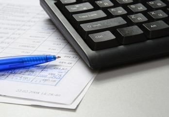 Laptop, pen, document.