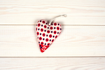 Heart  hand made on a wooden background