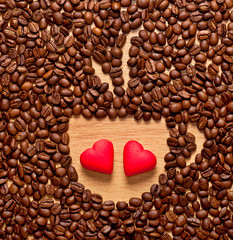 coffee beans cup and two heart