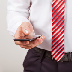 Touch screen mobile phone, in hand