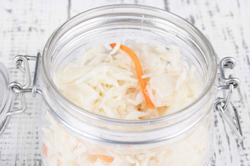 Marinated cabbage (sauerkraut) in glass jar,