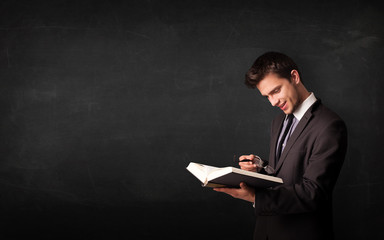 Young man reading a book